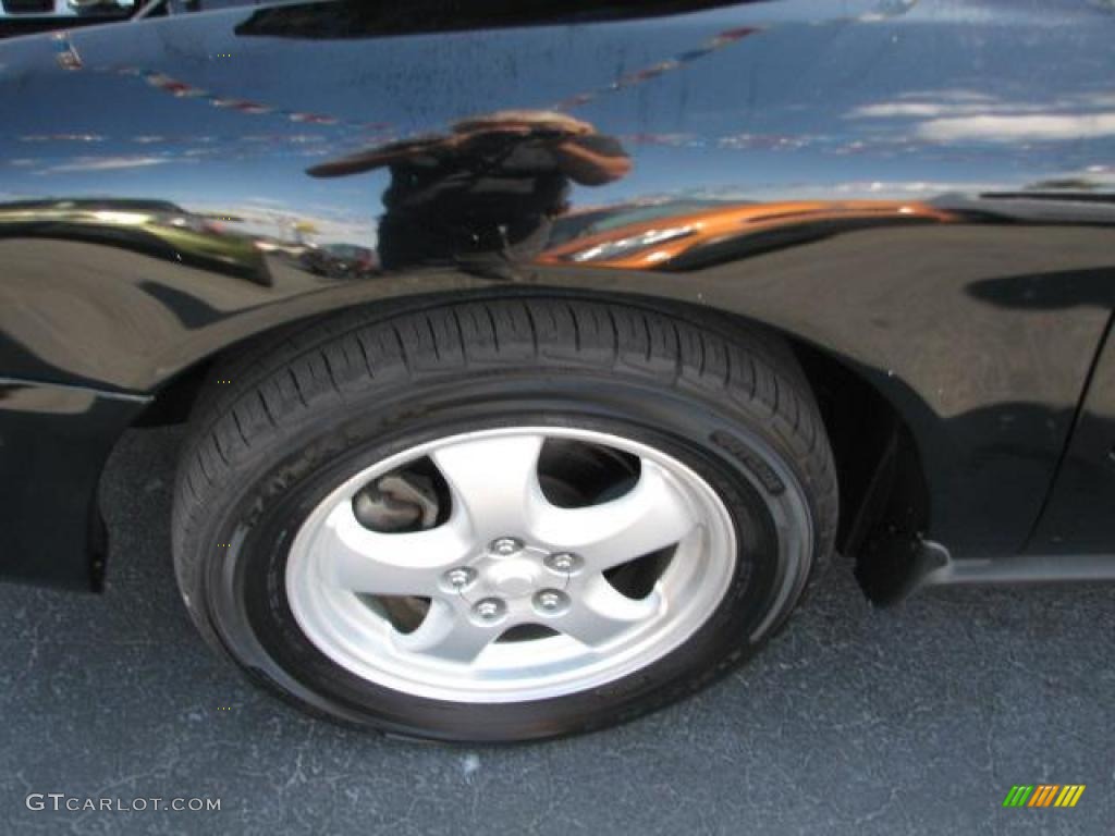 2004 Taurus SE Sedan - Black / Medium Graphite photo #23