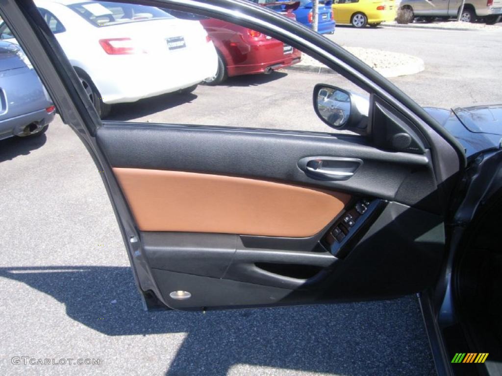 2004 Mazda RX-8 Grand Touring Black/Chapparal Door Panel Photo #46171667