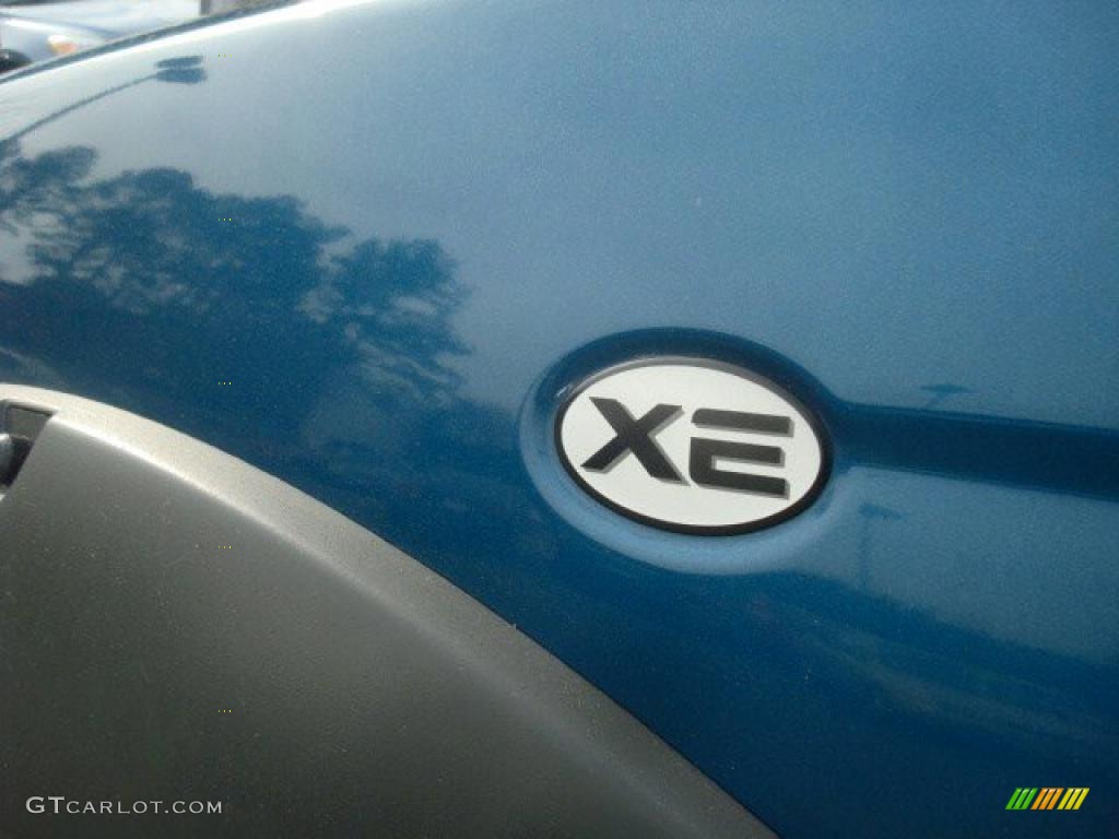 2003 Frontier XE V6 Crew Cab 4x4 - Electric Blue Metallic / Beige photo #23
