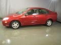 2000 Sangria Red Metallic Ford Focus SE Sedan  photo #3