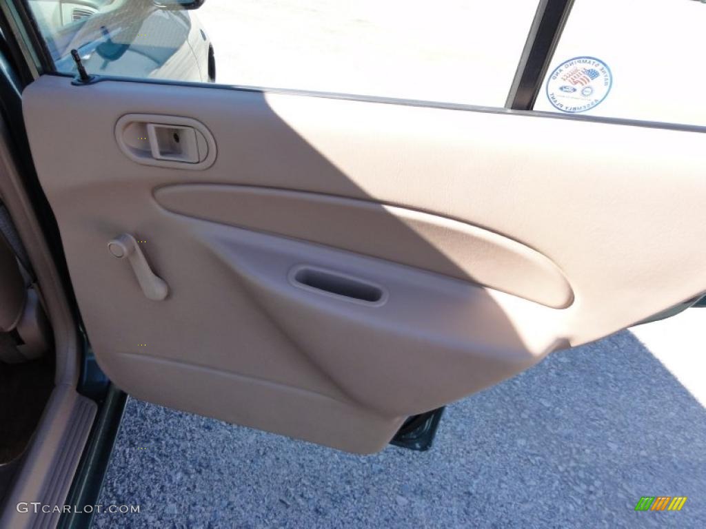 1998 Escort SE Sedan - Pacific Green Metallic / Beige photo #22