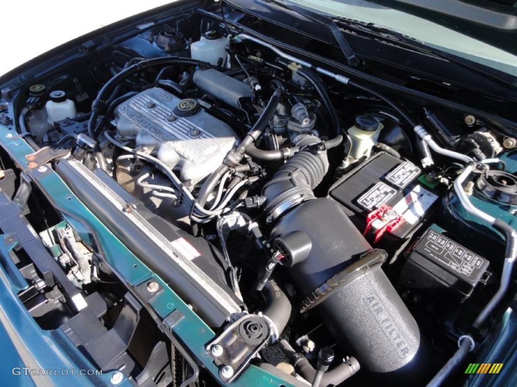 1998 Escort SE Sedan - Pacific Green Metallic / Beige photo #31