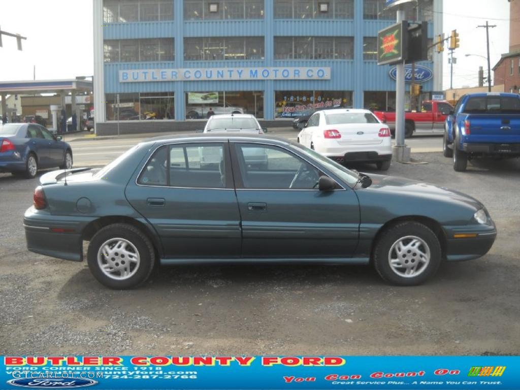 1998 Grand Am SE Sedan - Medium Green-Blue Metallic / Graphite photo #1