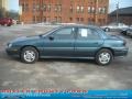 1998 Medium Green-Blue Metallic Pontiac Grand Am SE Sedan  photo #5
