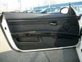 Black 2009 BMW 3 Series 335xi Coupe Door Panel