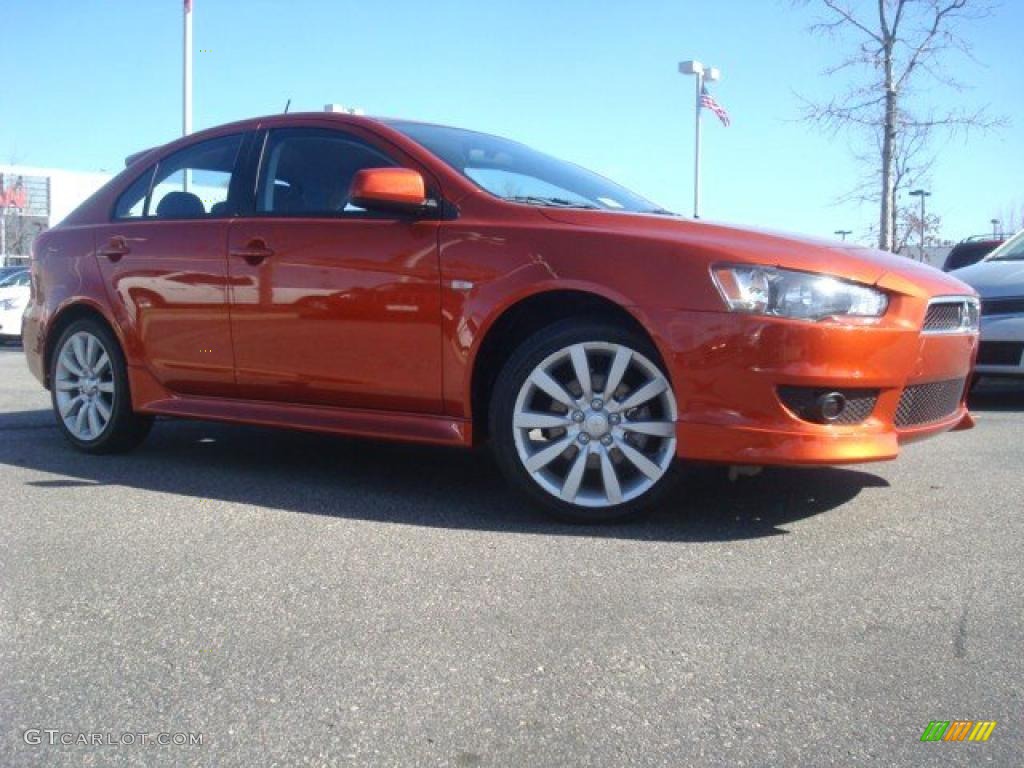 2010 Lancer Sportback GTS - Rotor Glow Orange Metallic / Black photo #2