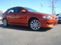 2010 Rotor Glow Orange Metallic Mitsubishi Lancer Sportback GTS  photo #2