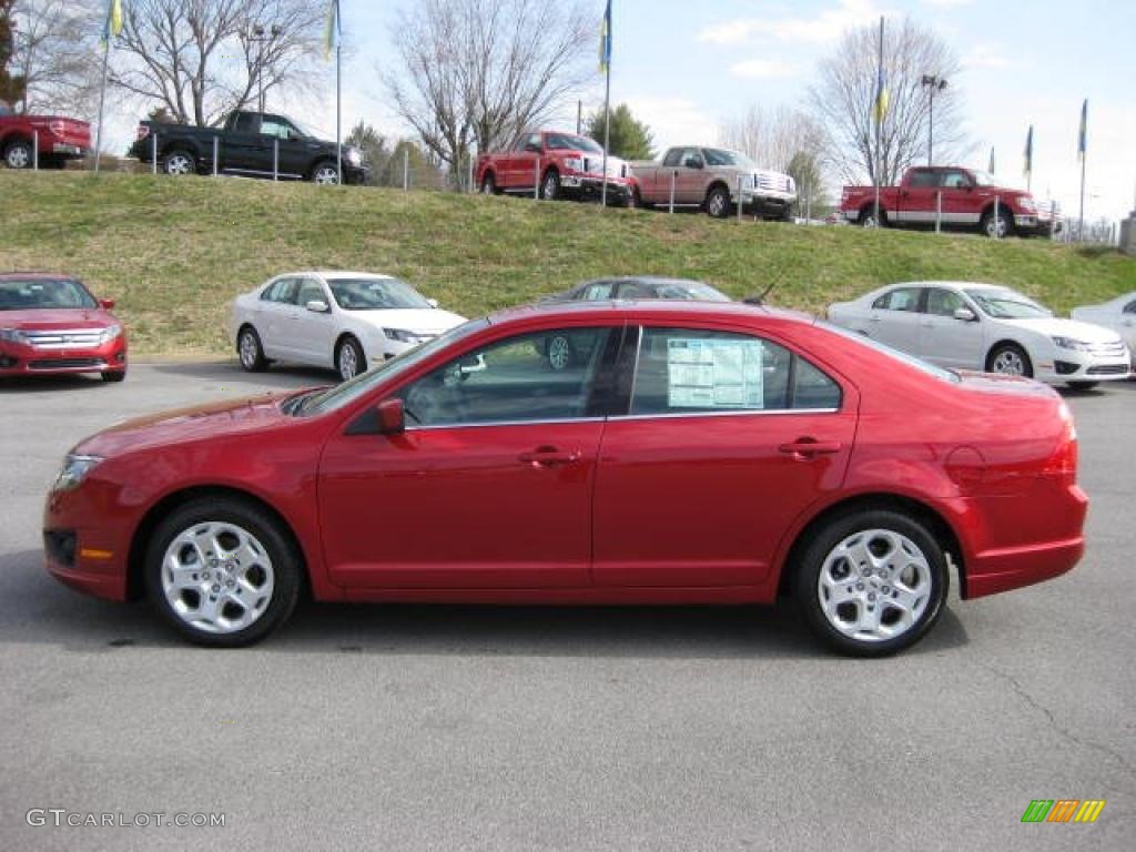 2011 Fusion SE - Red Candy Metallic / Medium Light Stone photo #1