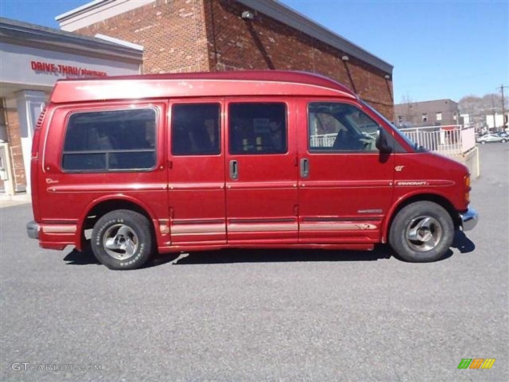 Madrid Red GMC Savana Van