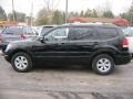 2009 Ebony Black Kia Borrego LX V6 4x4  photo #17