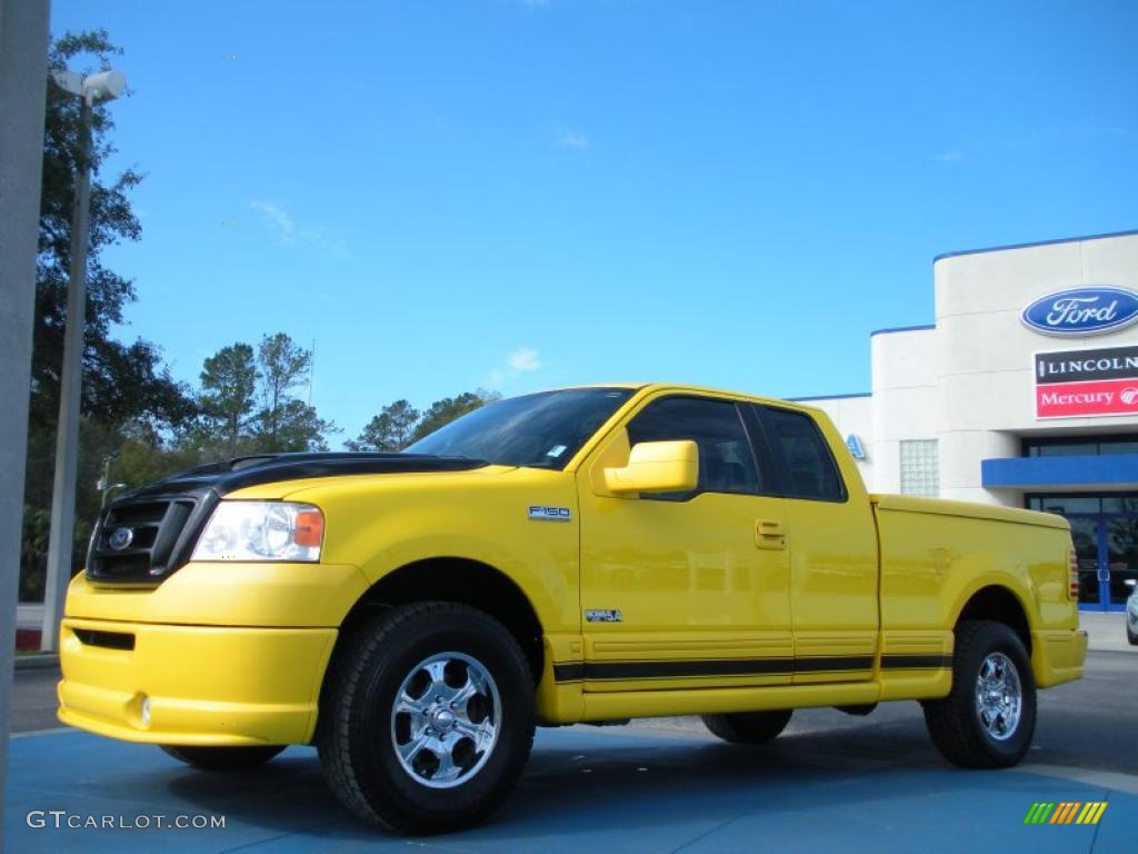 Yellow 2005 Ford F150 Boss 5.4 SuperCab 4x4 Exterior Photo #46287610