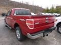 2011 Red Candy Metallic Ford F150 XLT SuperCab 4x4  photo #4