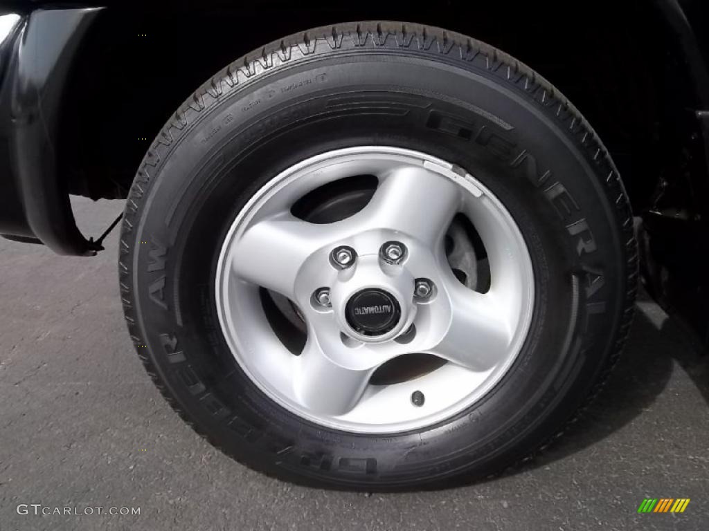 2000 Nissan Frontier SE V6 Extended Cab 4x4 Wheel Photo #46305550