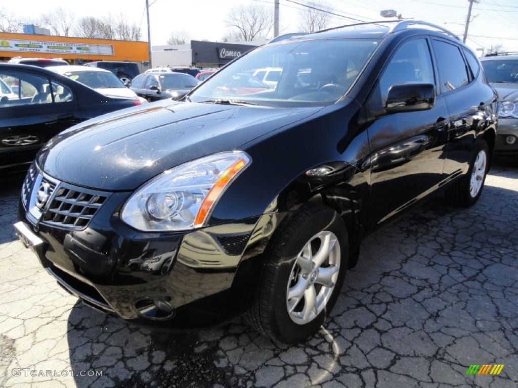 2009 Rogue SL AWD - Wicked Black / Black photo #1