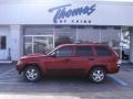 2006 Red Rock Crystal Pearl Jeep Grand Cherokee Laredo  photo #1