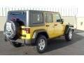 2011 Detonator Yellow Jeep Wrangler Unlimited Rubicon 4x4  photo #4