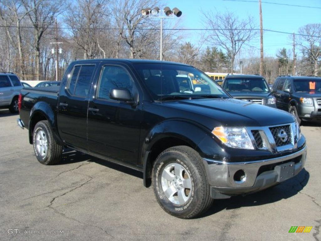 Super Black 2009 Nissan Frontier SE Crew Cab 4x4 Exterior Photo #46447062