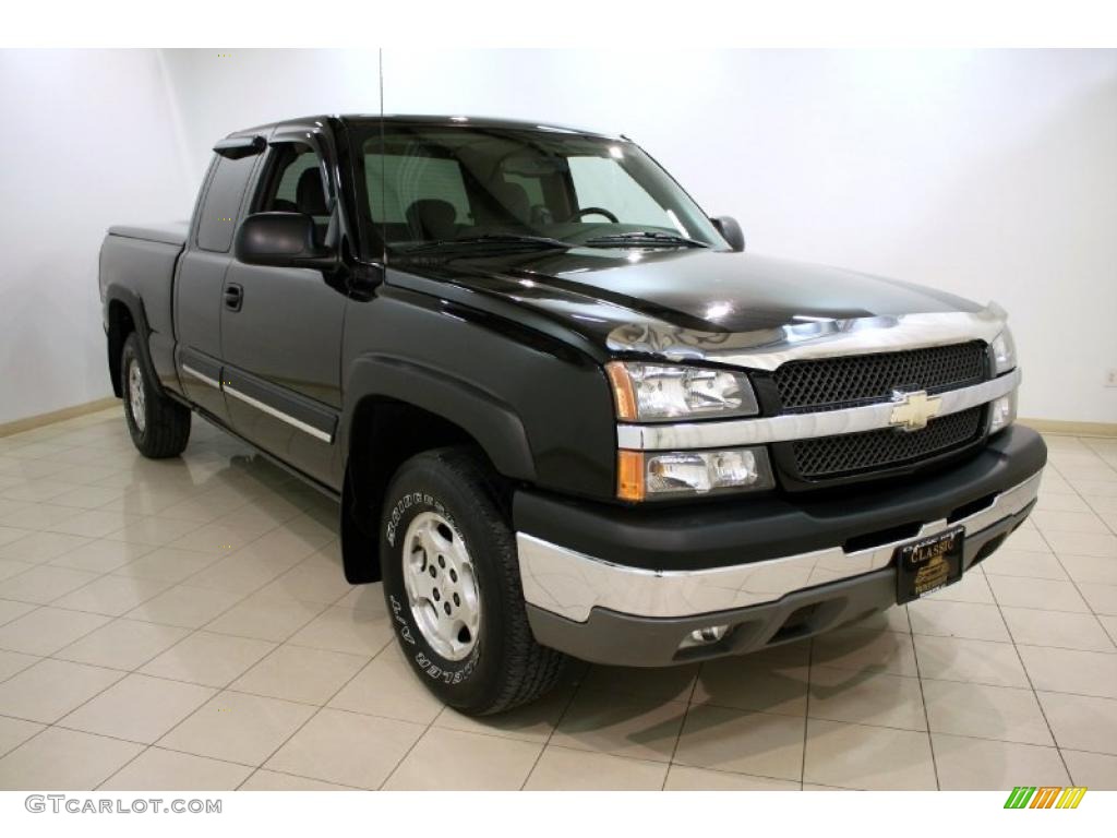 2004 Silverado 1500 LS Extended Cab 4x4 - Black / Dark Charcoal photo #1