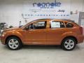 2011 Mango Tango Pearl Dodge Caliber Mainstreet  photo #7