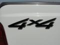 2001 Ford F250 Super Duty XLT SuperCab 4x4 Badge and Logo Photo