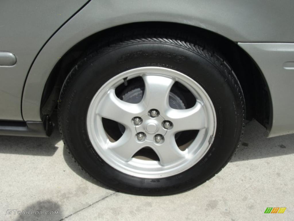 2004 Ford Taurus SE Sedan Wheel Photo #46481526