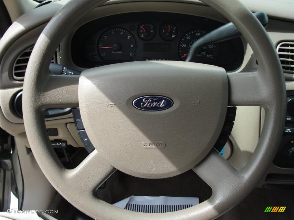 2004 Ford Taurus SE Sedan Medium Parchment Steering Wheel Photo #46481673