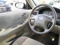 Beige 2001 Mazda 626 LX Steering Wheel