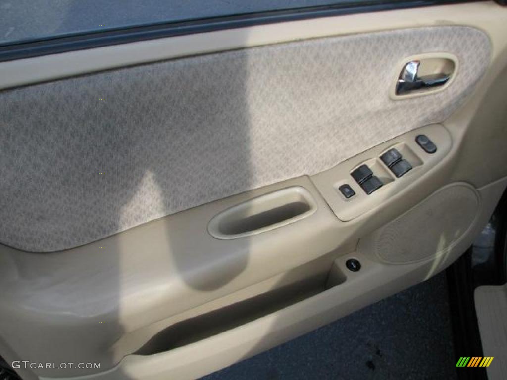 2001 626 LX - Black Onyx / Beige photo #19