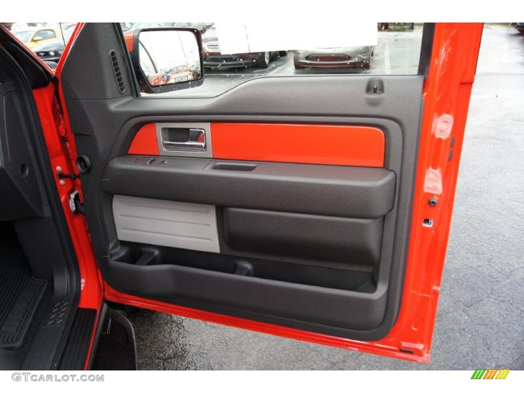 2011 Ford F150 SVT Raptor SuperCrew 4x4 Raptor Black/Orange Door Panel Photo #46522164