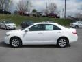 Super White - Camry LE Photo No. 1