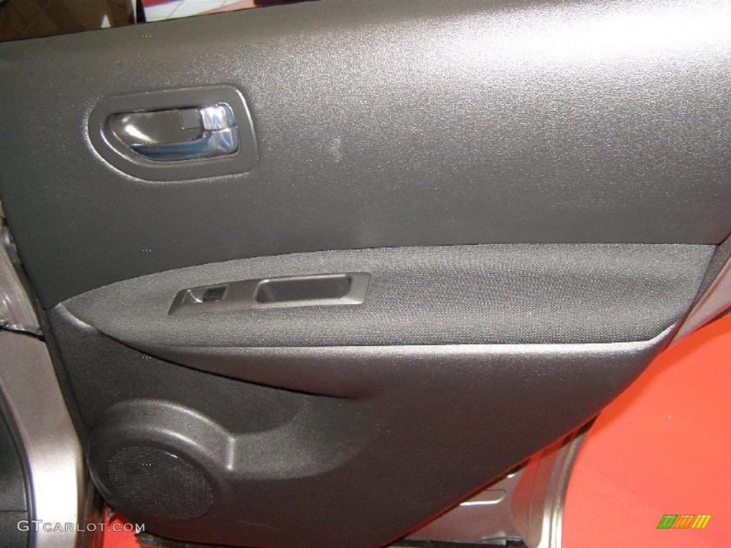 2010 Nissan Rogue AWD Krom Edition Black Door Panel Photo #46589739