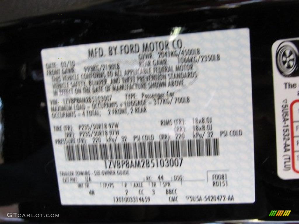 2011 Mustang V6 Premium Coupe - Ebony Black / Saddle photo #14