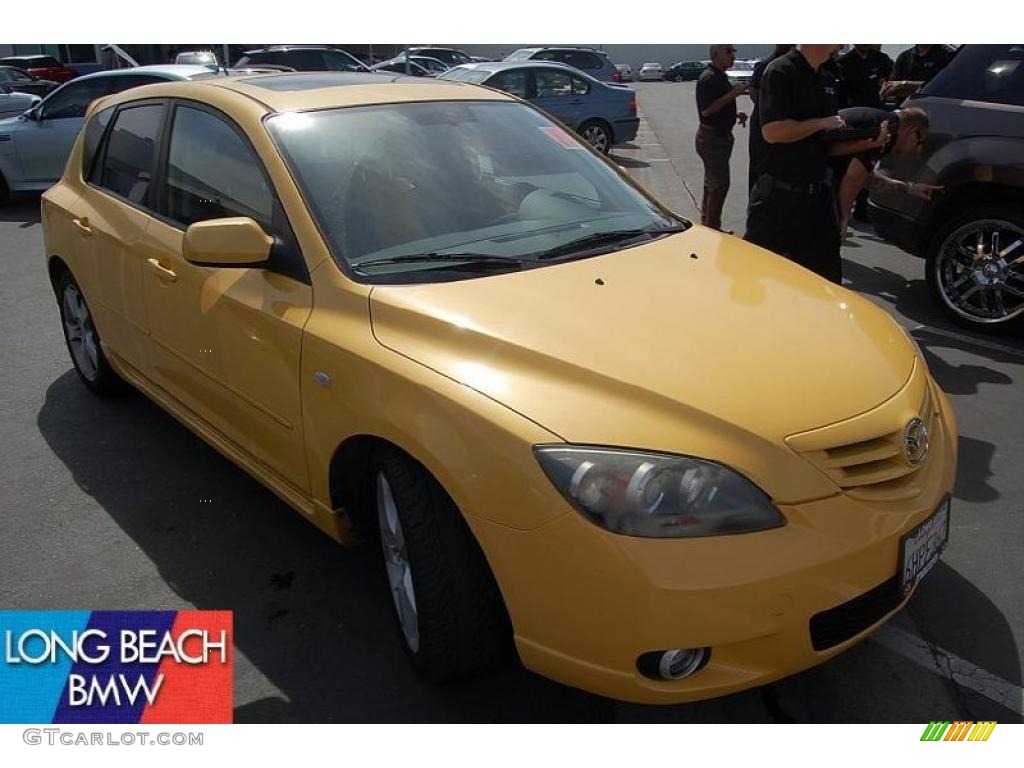 2004 MAZDA3 s Hatchback - Solar Yellow Mica / Black/Yellow photo #1