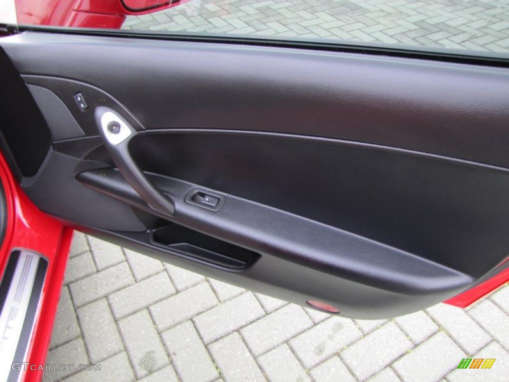 2008 Chevrolet Corvette Coupe Ebony Door Panel Photo #46670323