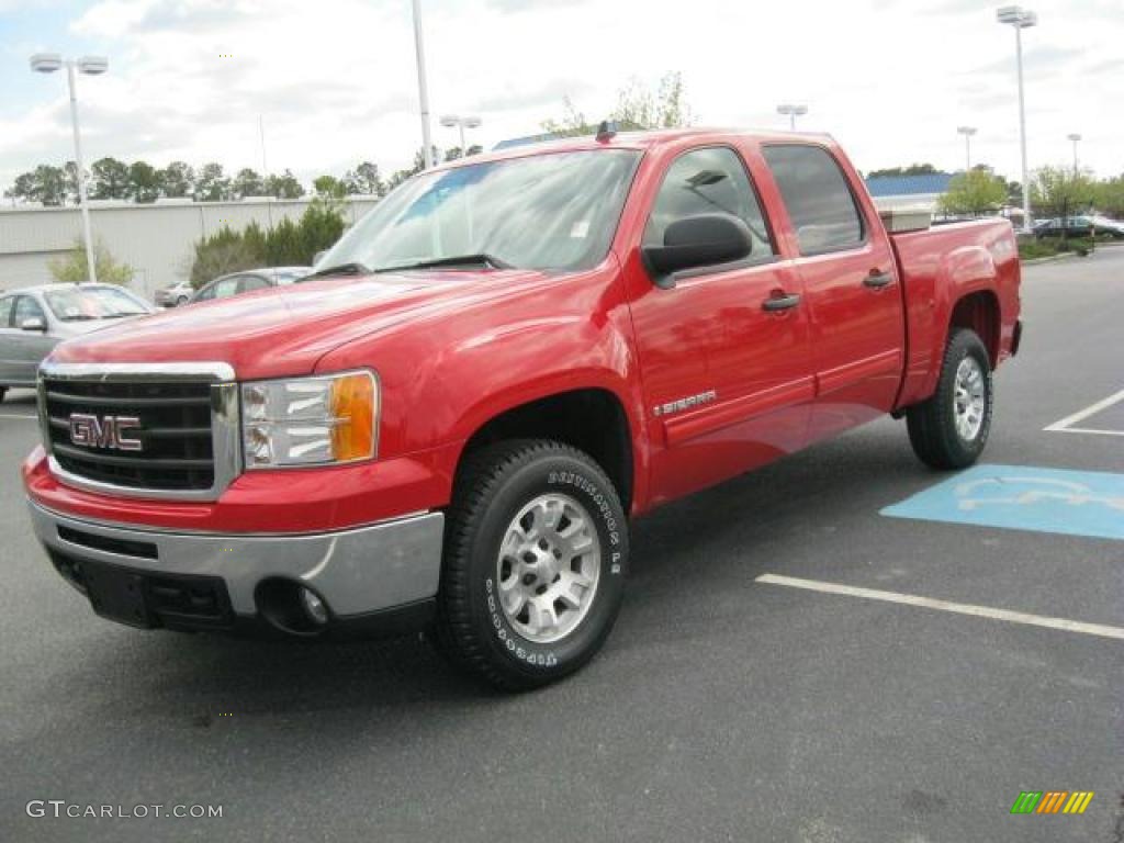 Fire Red 2007 GMC Sierra 1500 SLE Crew Cab 4x4 Exterior Photo #46671683