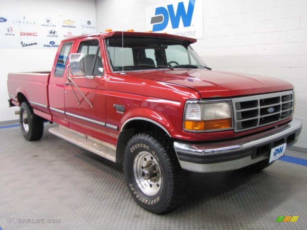 1997 F250 XLT Extended Cab 4x4 - Toreador Red Metallic / Medium Graphite photo #1