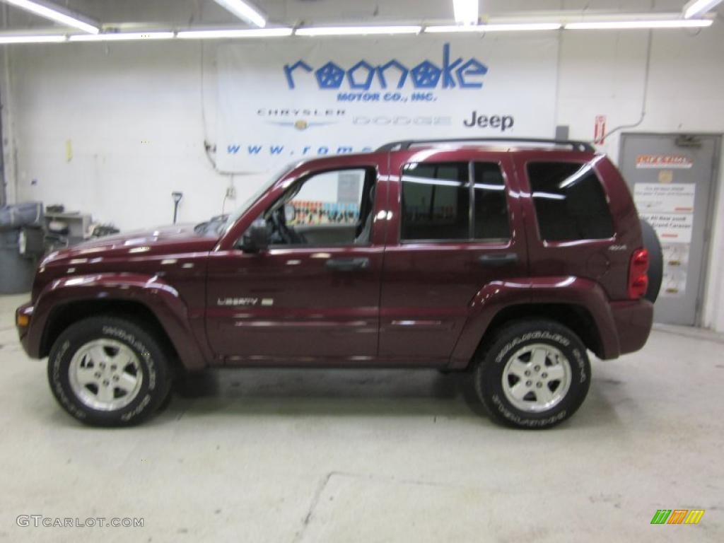 2002 Liberty Limited 4x4 - Dark Garnet Red Pearlcoat / Taupe photo #1