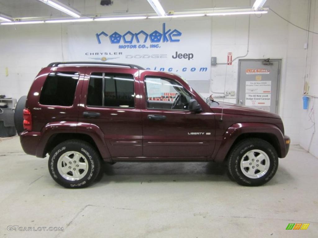2002 Liberty Limited 4x4 - Dark Garnet Red Pearlcoat / Taupe photo #4