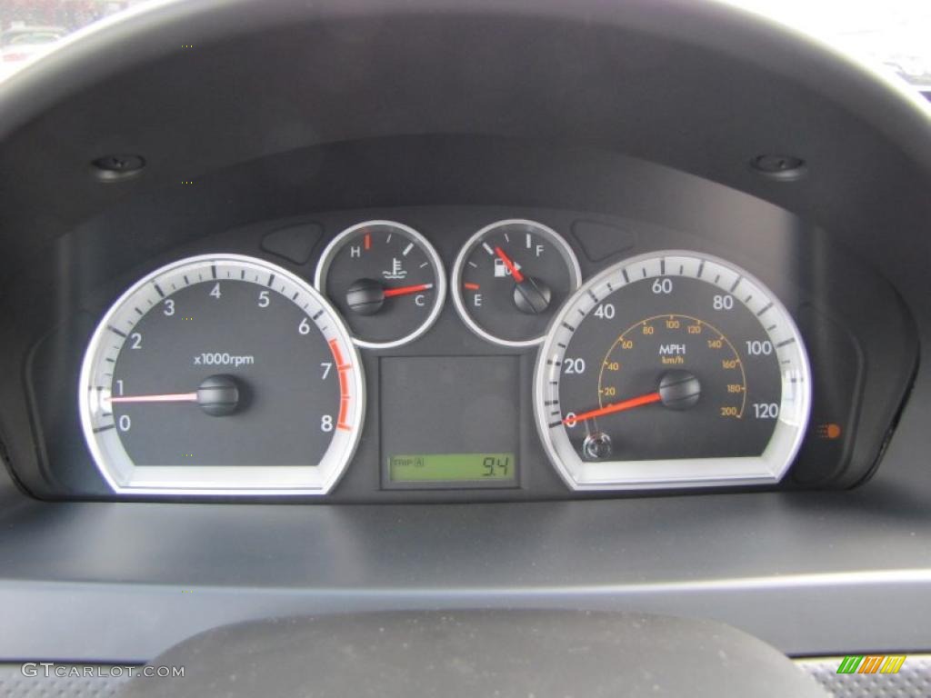 2011 Chevrolet Aveo LT Sedan Gauges Photo #46678880