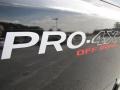 2011 Nissan Titan Pro-4X Crew Cab 4x4 Badge and Logo Photo