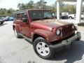 2007 Red Rock Crystal Pearl Jeep Wrangler Unlimited Sahara  photo #1