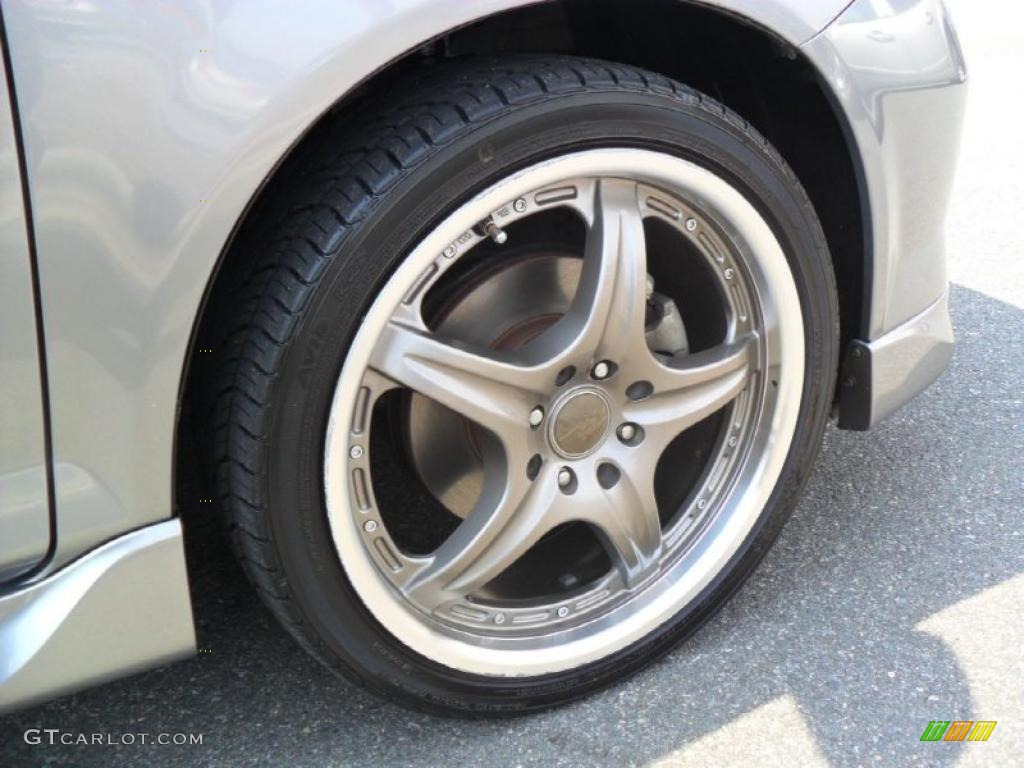 2010 Honda Fit Standard Fit Model Custom Wheels Photo #46691543