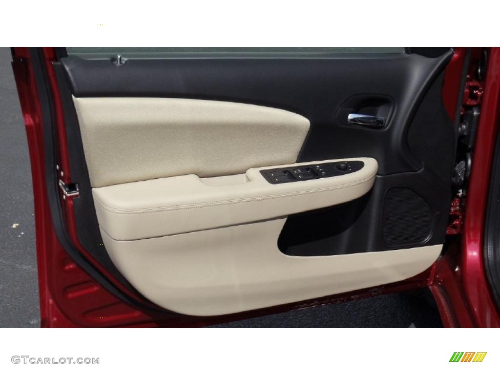 2011 Chrysler 200 Touring Black/Light Frost Beige Door Panel Photo #46692218