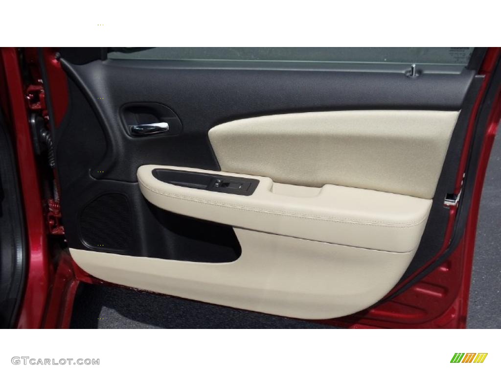 2011 Chrysler 200 Touring Black/Light Frost Beige Door Panel Photo #46692263