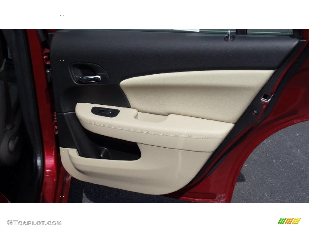 2011 Chrysler 200 Touring Black/Light Frost Beige Door Panel Photo #46692272