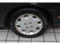 1996 Saturn S Series SW1 Wagon Wheel and Tire Photo