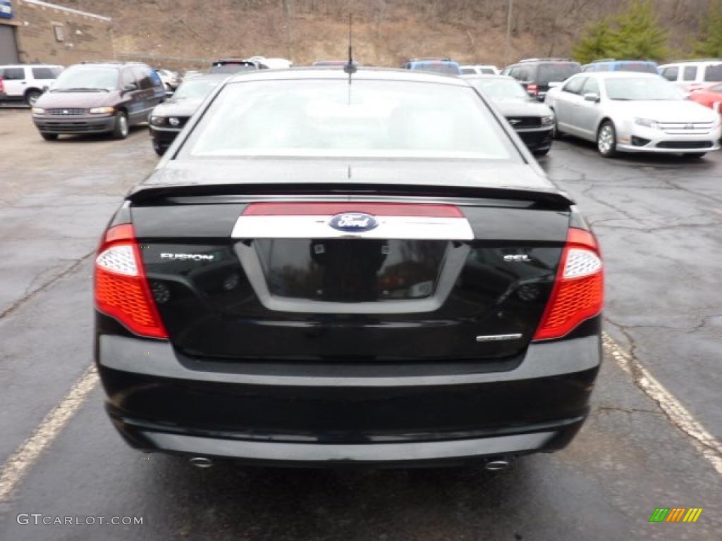 2011 Fusion SEL V6 - Tuxedo Black Metallic / Medium Light Stone photo #3