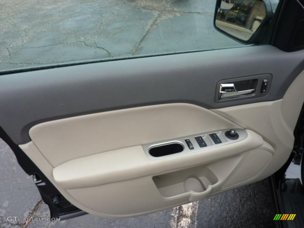 2011 Fusion SEL V6 - Tuxedo Black Metallic / Medium Light Stone photo #11
