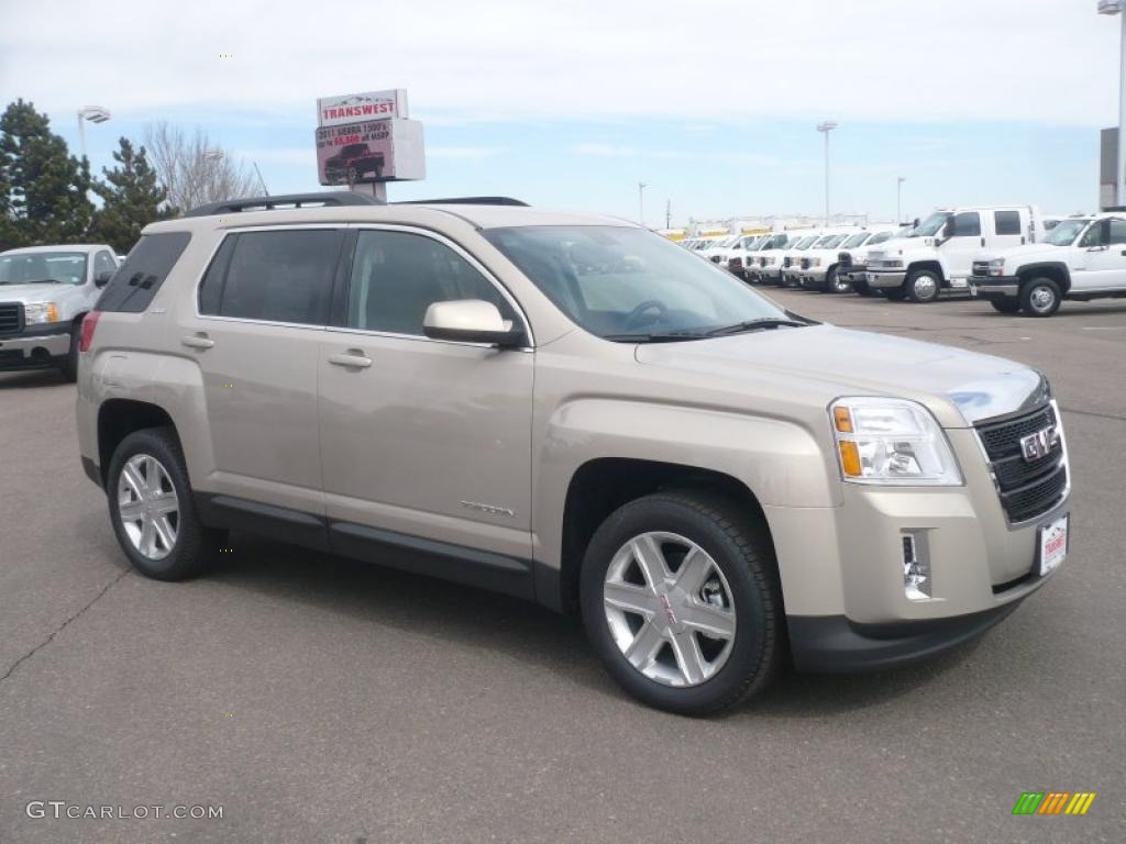 2011 Terrain SLE AWD - Gold Mist Metallic / Jet Black photo #1