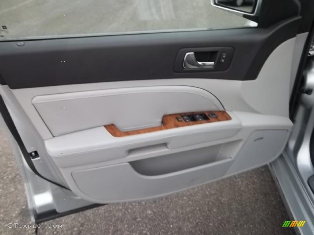 2011 Cadillac STS 4 V6 AWD Light Gray/Ebony Door Panel Photo #46743997